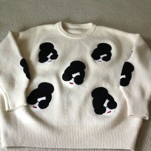 Stylish Cream Sweater with Black Pattern